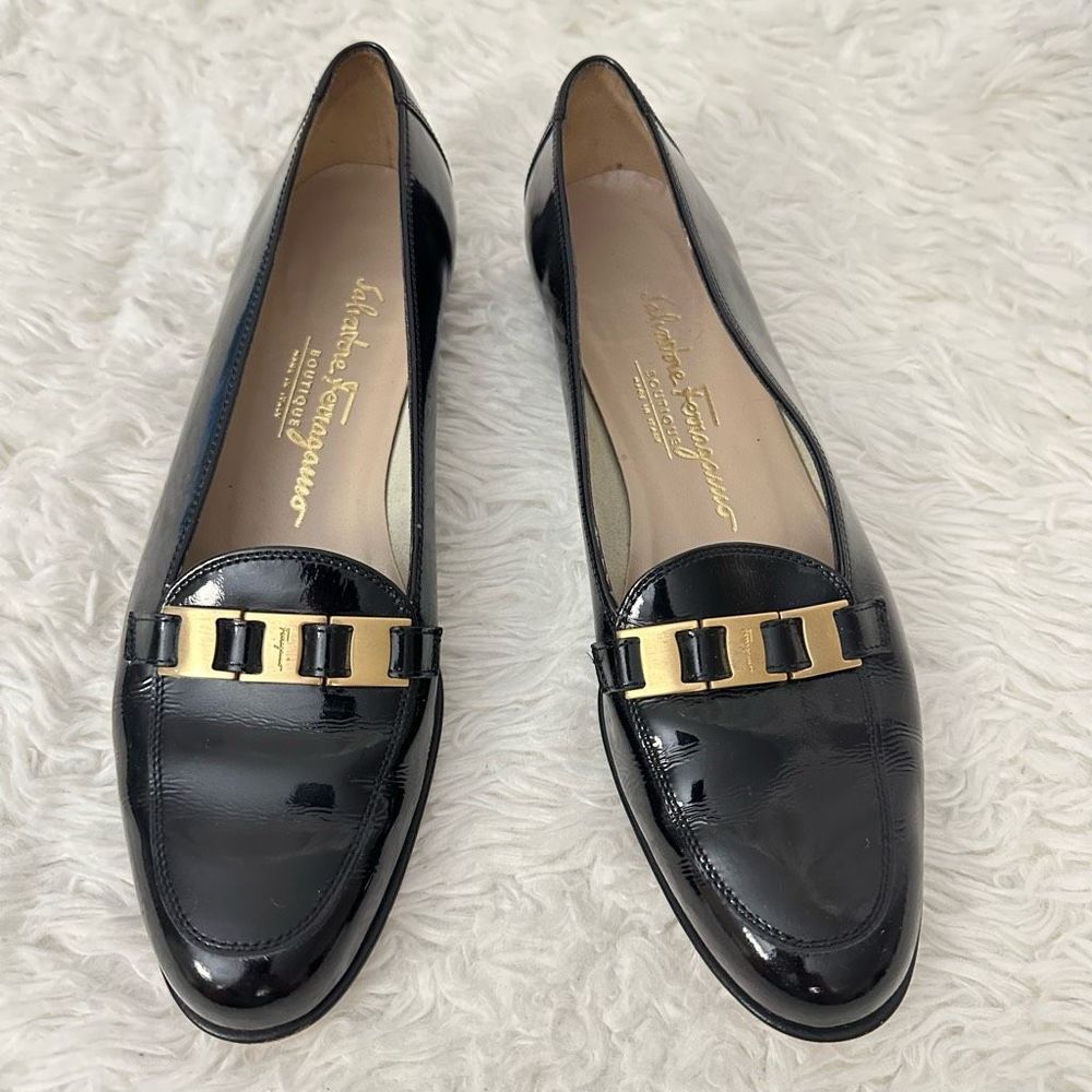 Salvatore Ferragamo Black and Gold Loafers